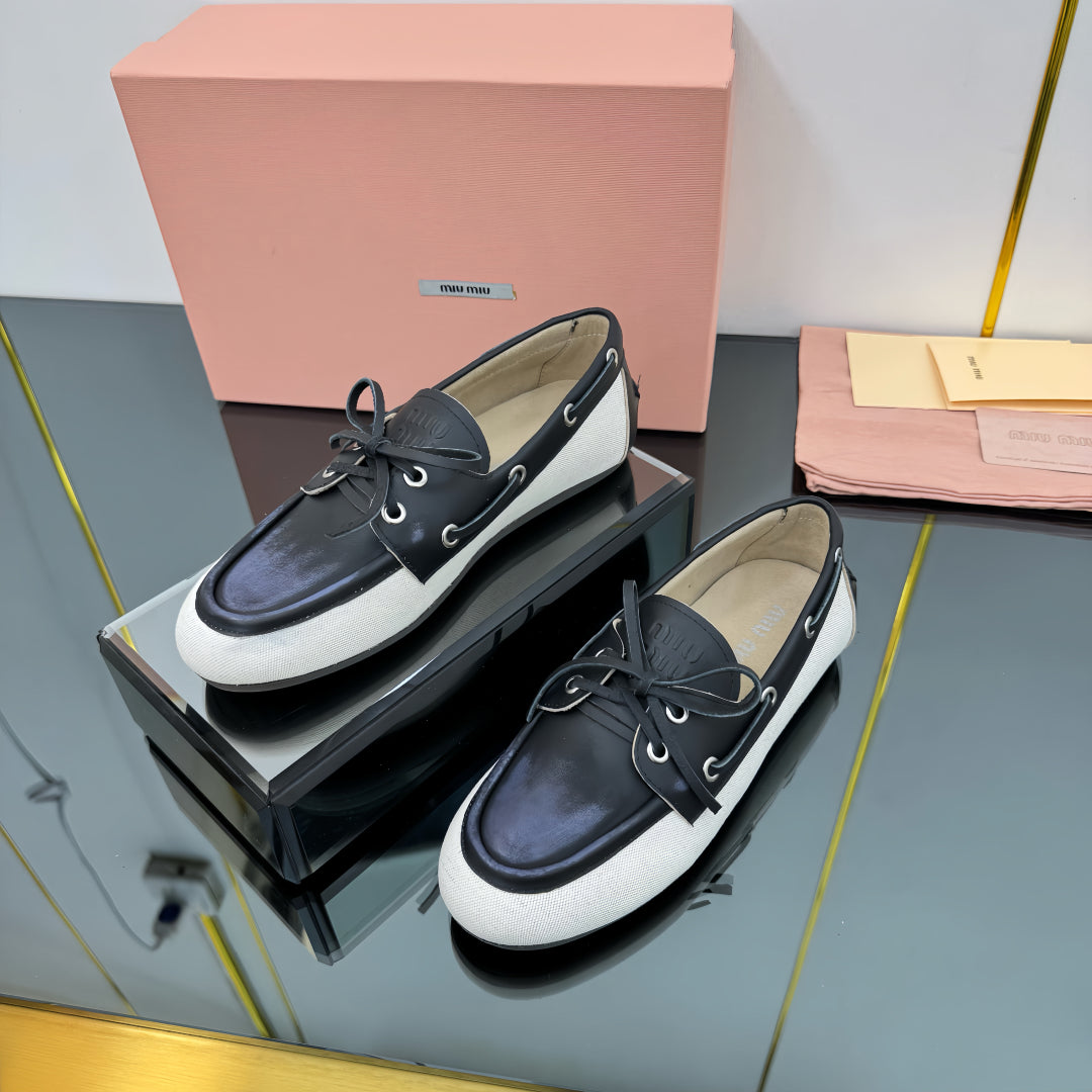 BOAT SHOES IN BLACK CALFSKIN AND WHITE CANVAS - 35