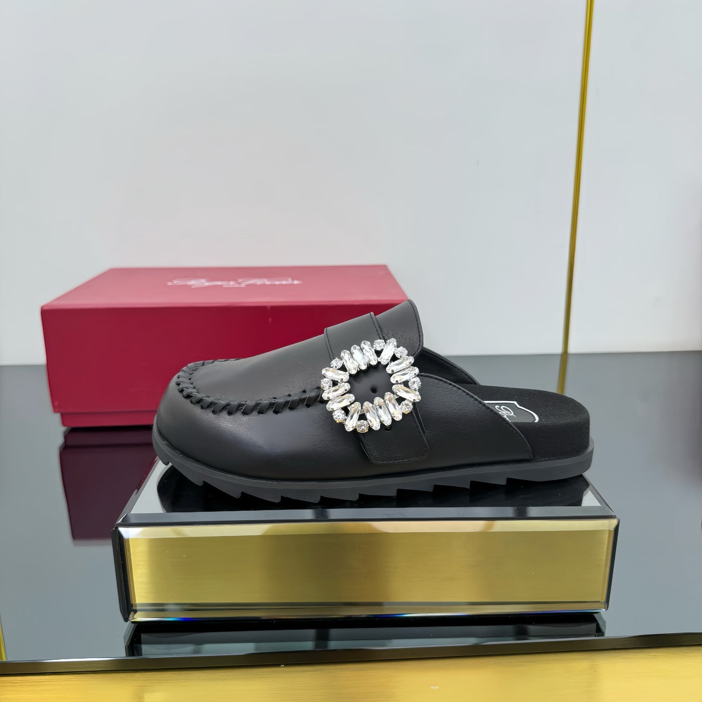 SLIDY VIV' MULES IN BLACK CALFSKIN - 35