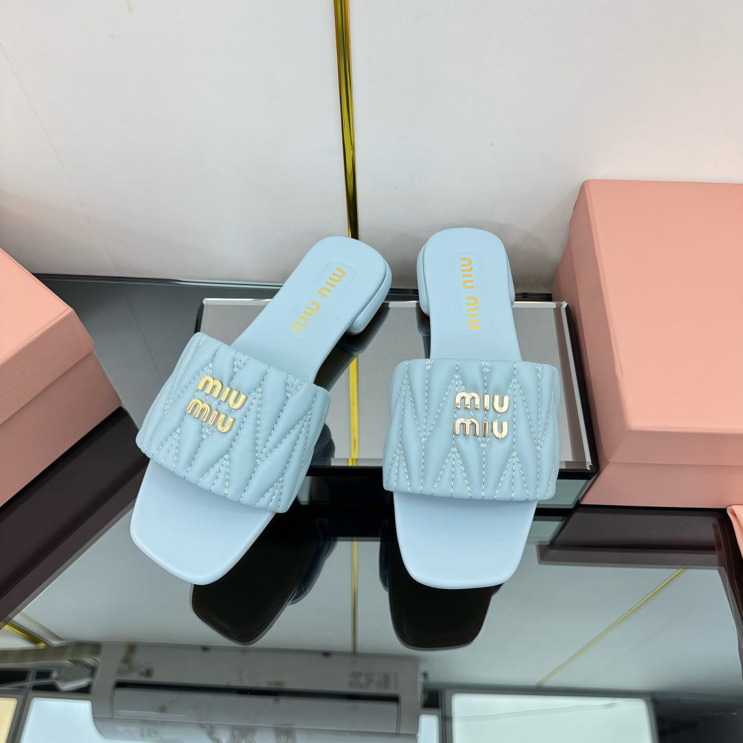 MATELASSÉ SLIDES IN BABY BLUE CALFSKIN - 35
