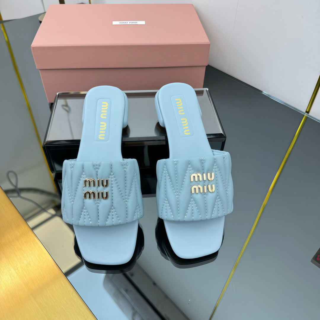 MATELASSÉ SLIDES IN BABY BLUE CALFSKIN - 35