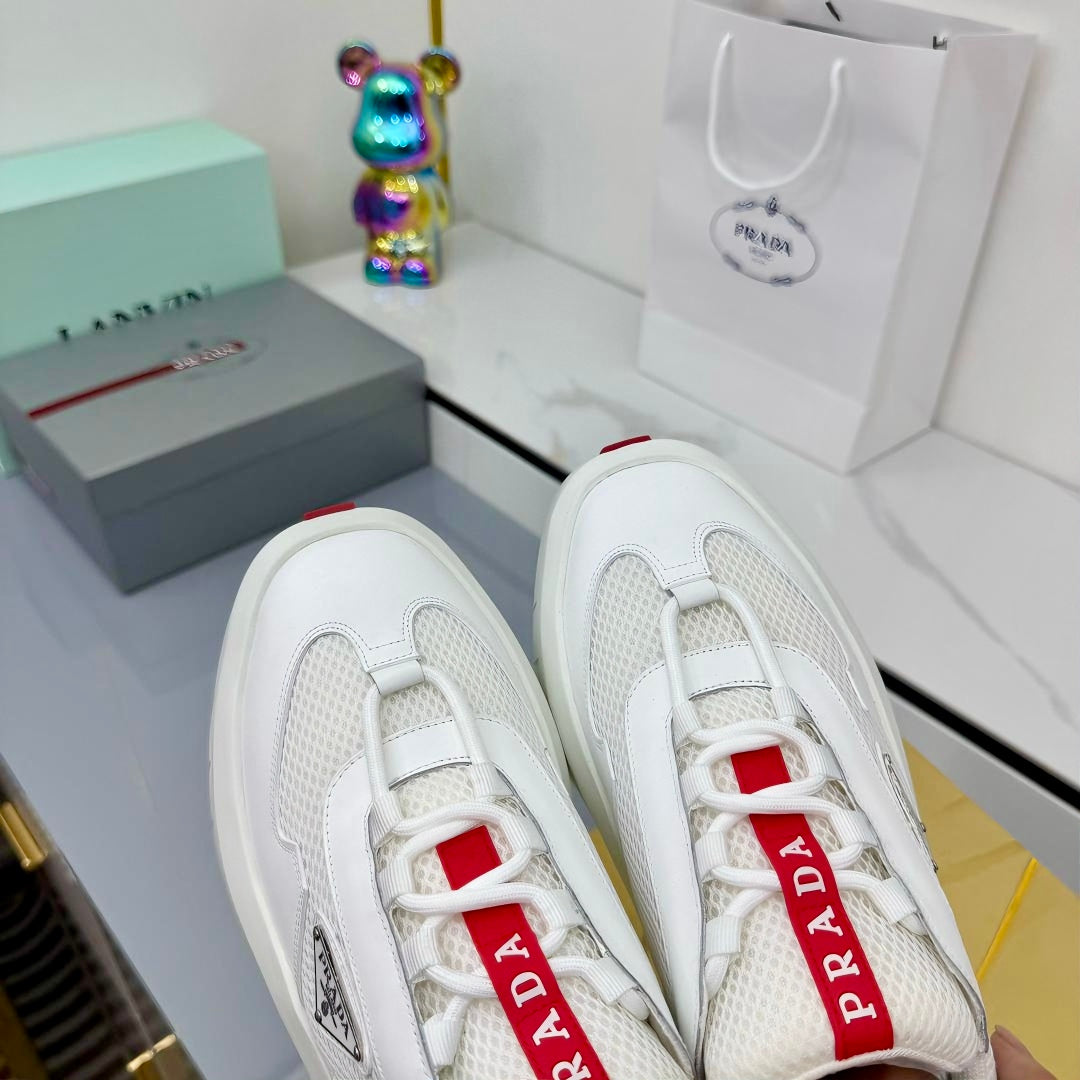 PRADA 25S CROSS LACED SNEAKERS IN WHITE CALFSKIN - 35