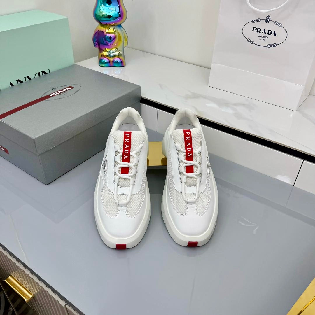 PRADA 25S CROSS LACED SNEAKERS IN WHITE CALFSKIN - 35