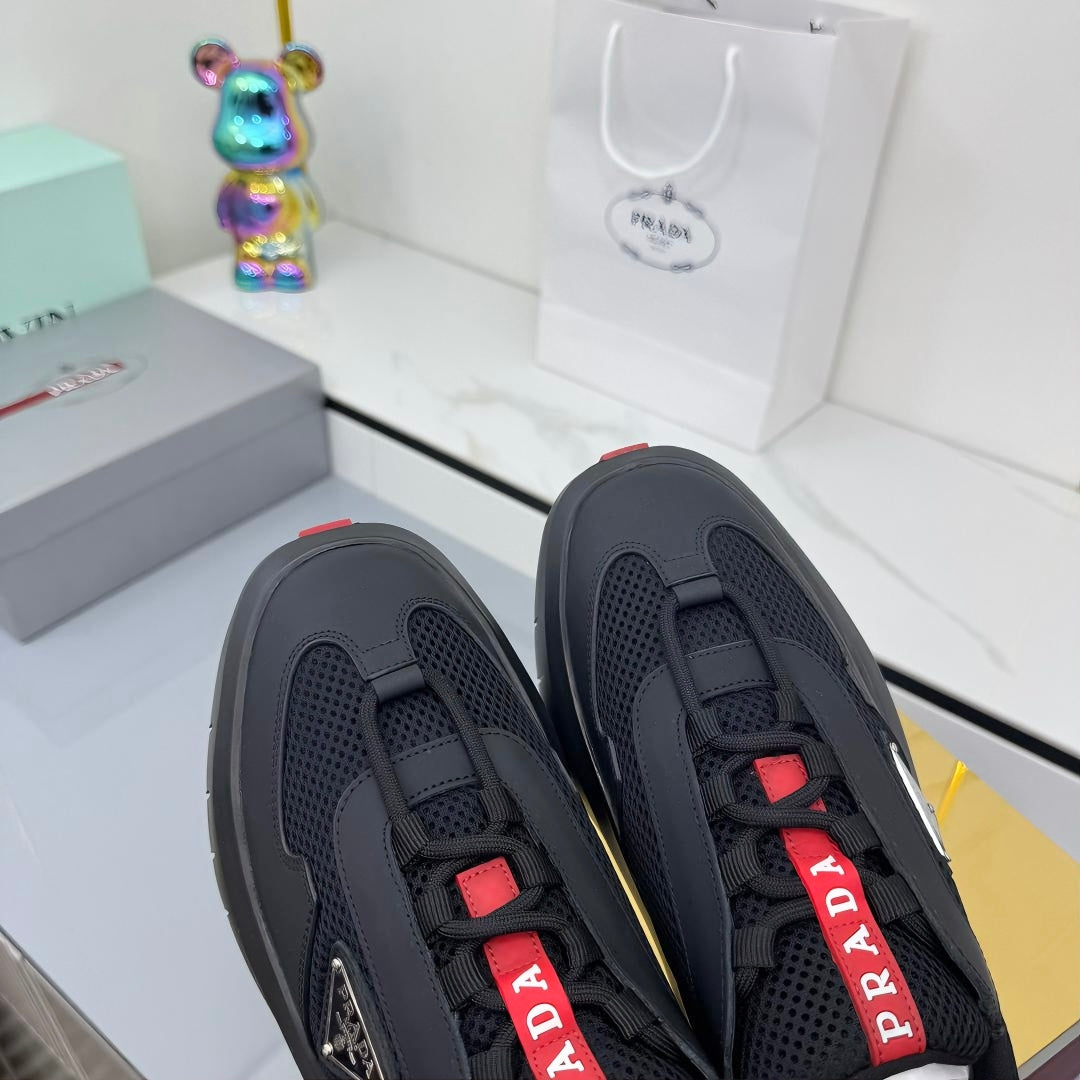 PRADA 25S CROSS LACED SNEAKERS IN BLACK CALFSKIN - 35