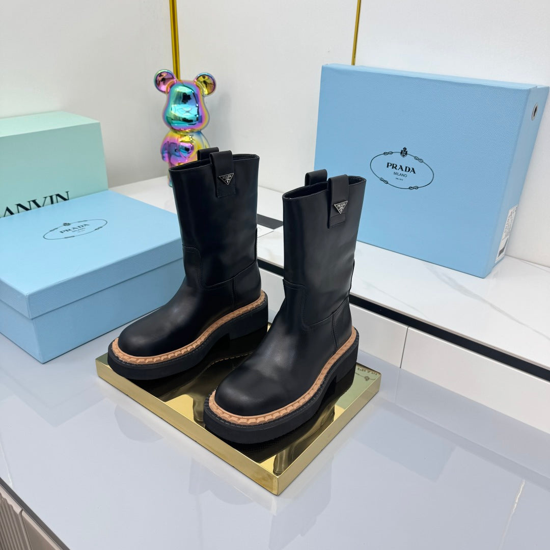 PRADA 25S HIGH MARTIN BOOTS 50MM IN BLACK CALFSKIN - 35