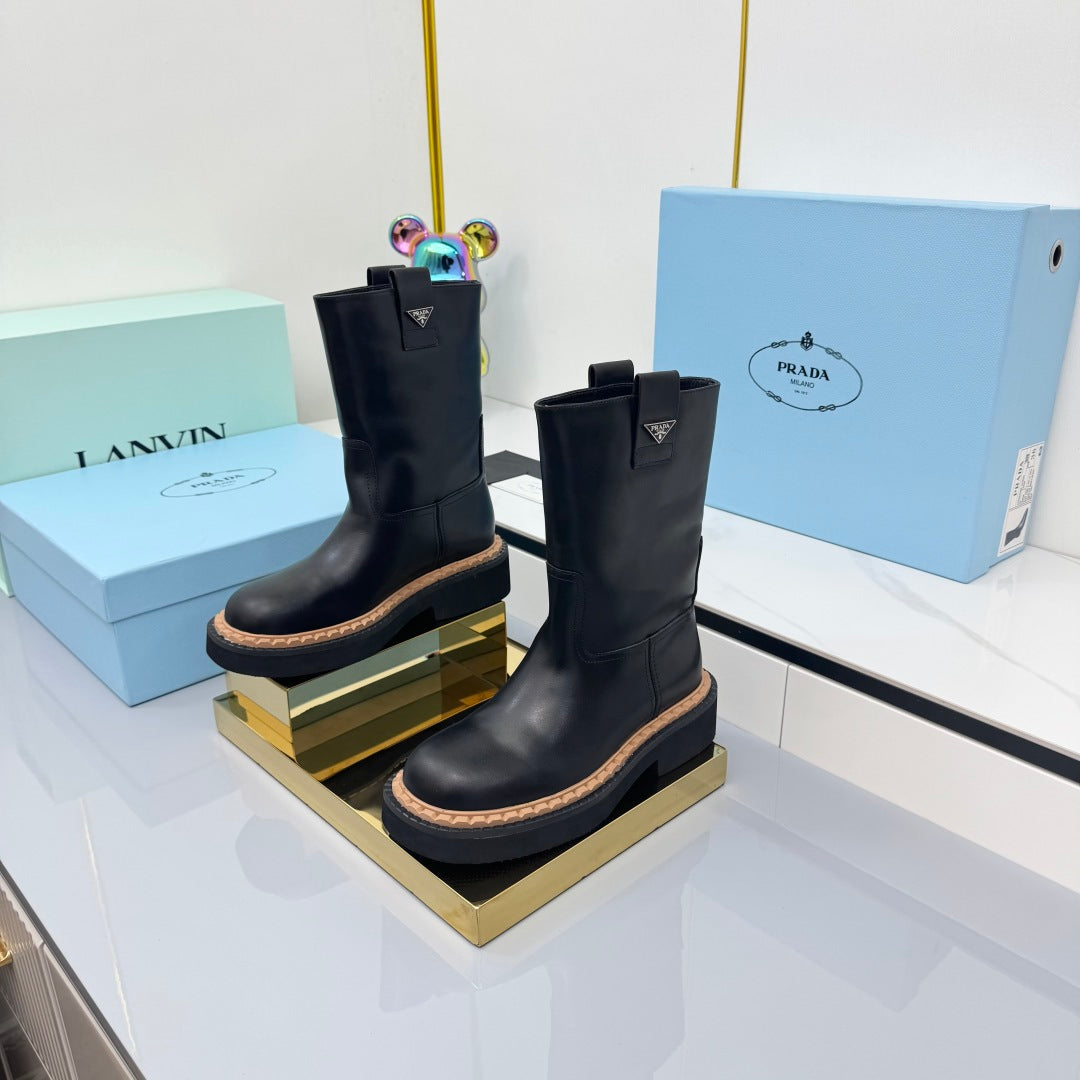 PRADA 25S HIGH MARTIN BOOTS 50MM IN BLACK CALFSKIN - 35