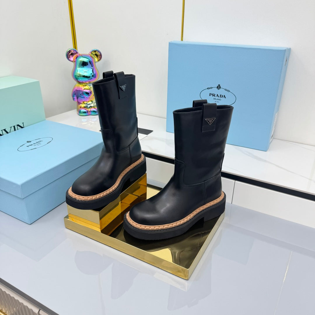 PRADA 25S HIGH MARTIN BOOTS 50MM IN BLACK CALFSKIN - 35