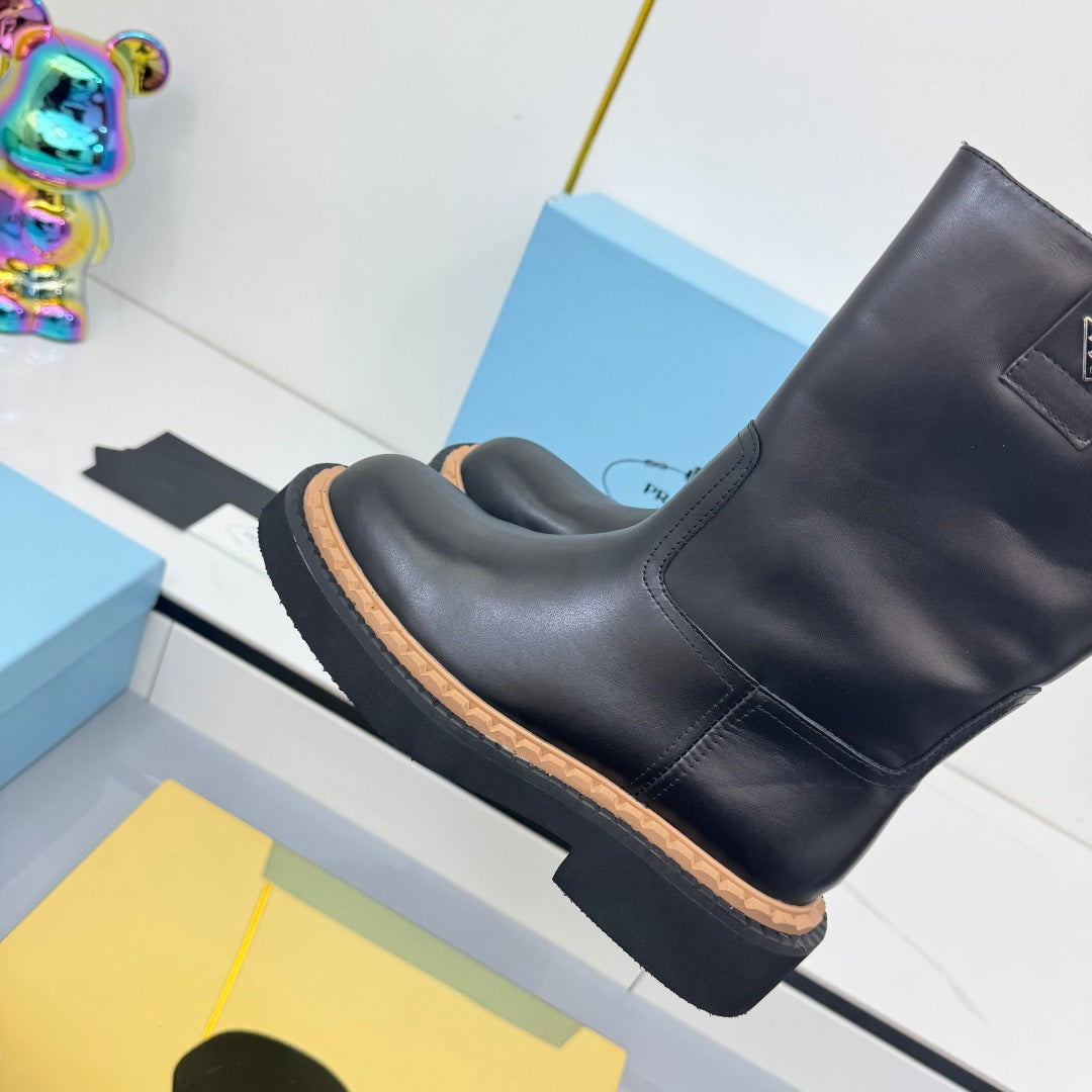 PRADA 25S HIGH MARTIN BOOTS 50MM IN BLACK CALFSKIN - 35