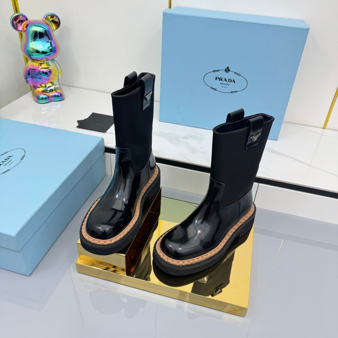 PRADA 25S HIGH MARTIN BOOTS 50MM IN BLACK GLOSSY CALFSKIN - 35