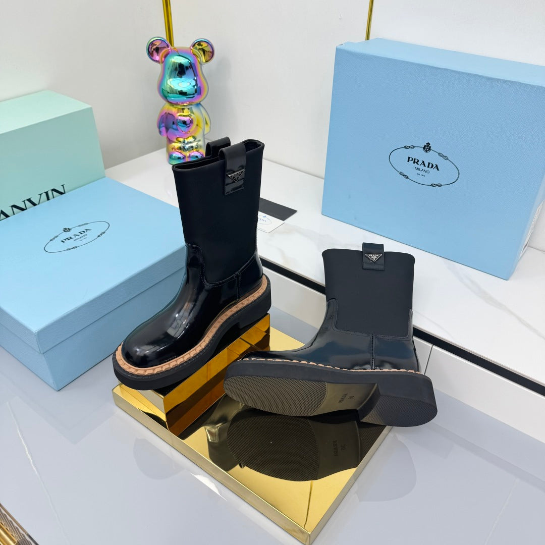 PRADA 25S HIGH MARTIN BOOTS 50MM IN BLACK GLOSSY CALFSKIN - 35