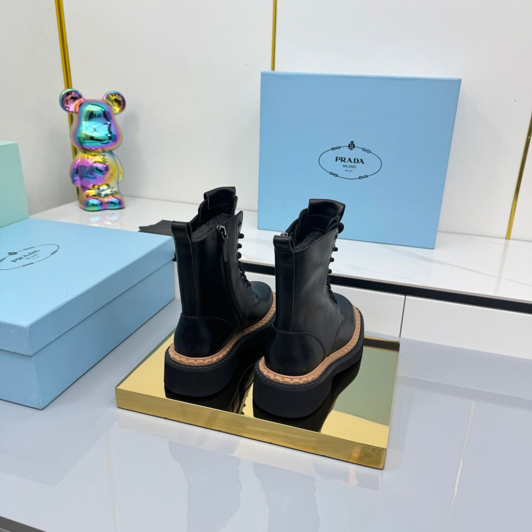 PRADA 25S LONG THICK SOLED MARTIN BOOTS 50MM IN BLACK CALFSKIN - 35
