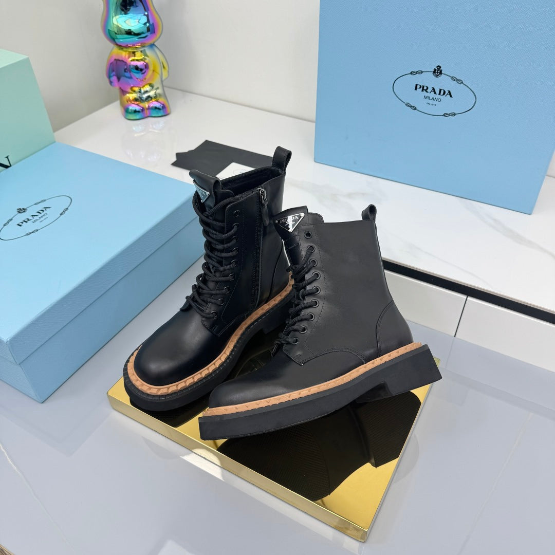 PRADA 25S LONG THICK SOLED MARTIN BOOTS 50MM IN BLACK CALFSKIN - 35