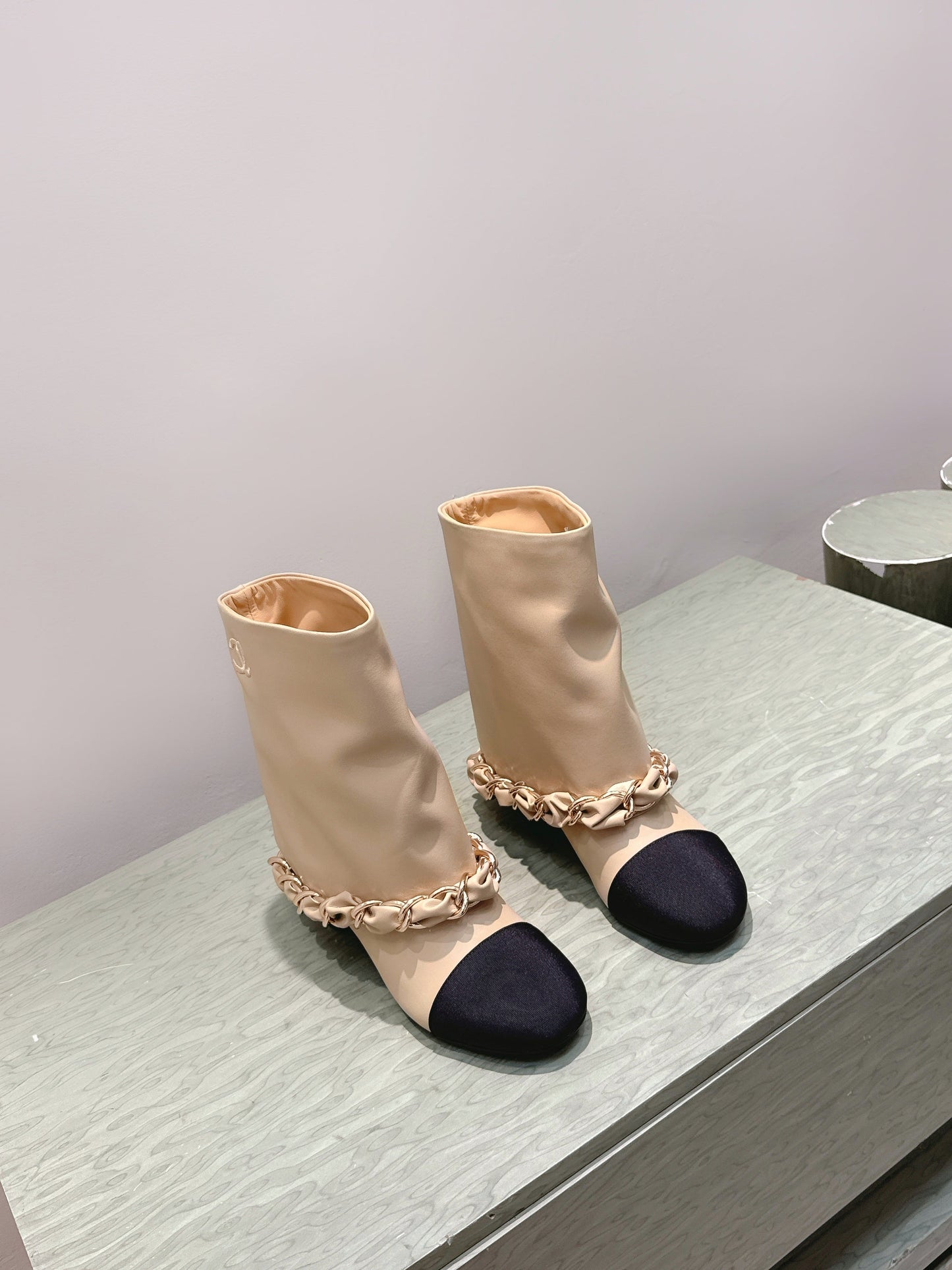 CHANEL 25S CALF-LENGTH BOOTS 45MM IN BEIGE AND BLACK CALFSKIN GOLD HARDWARE - 35