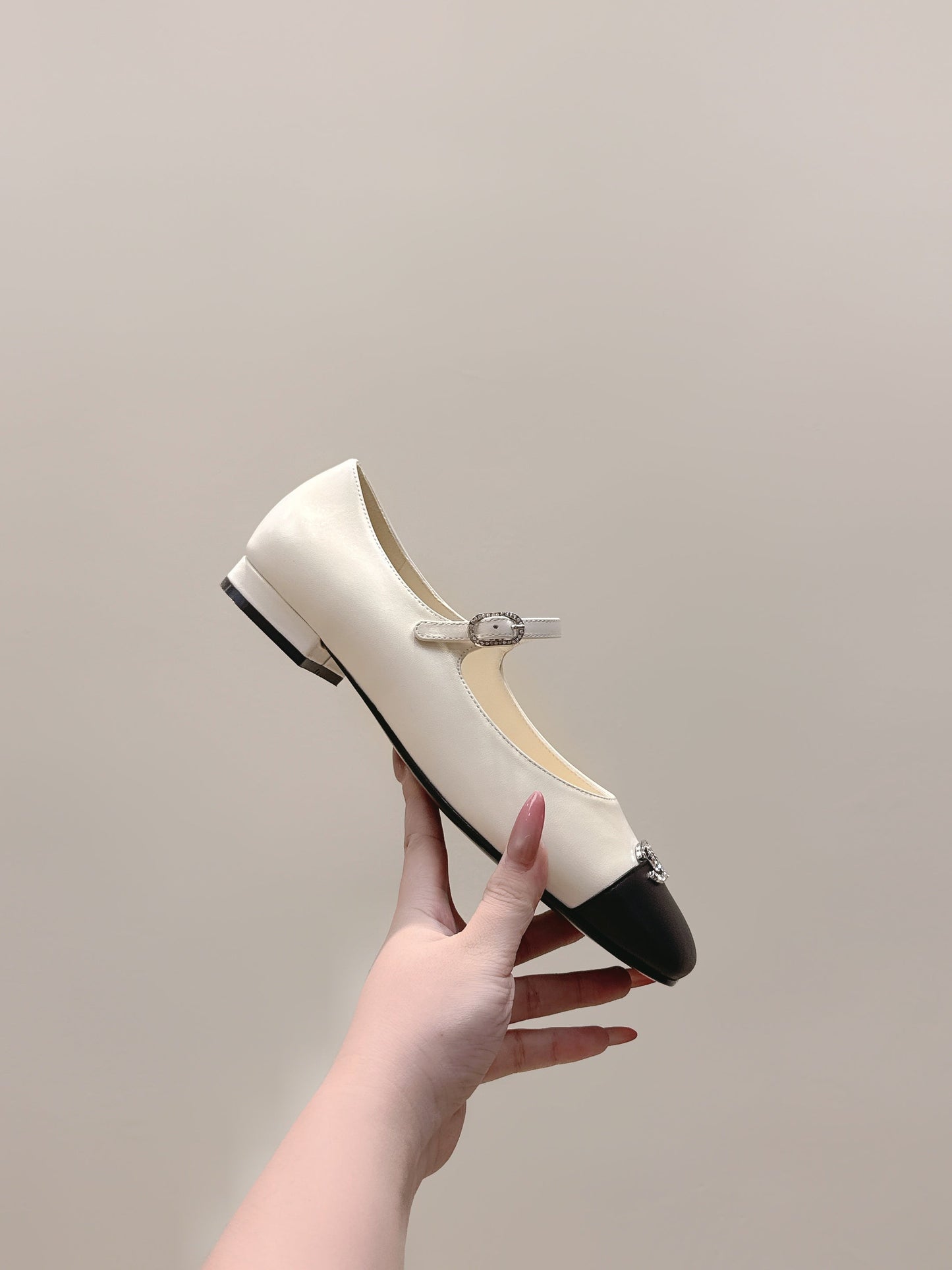 CHANEL 25S MARY JANE FLATS IN IVORY LAMBSKIN WITH BLACK CAP TOE SILVER HARDWARE - 35