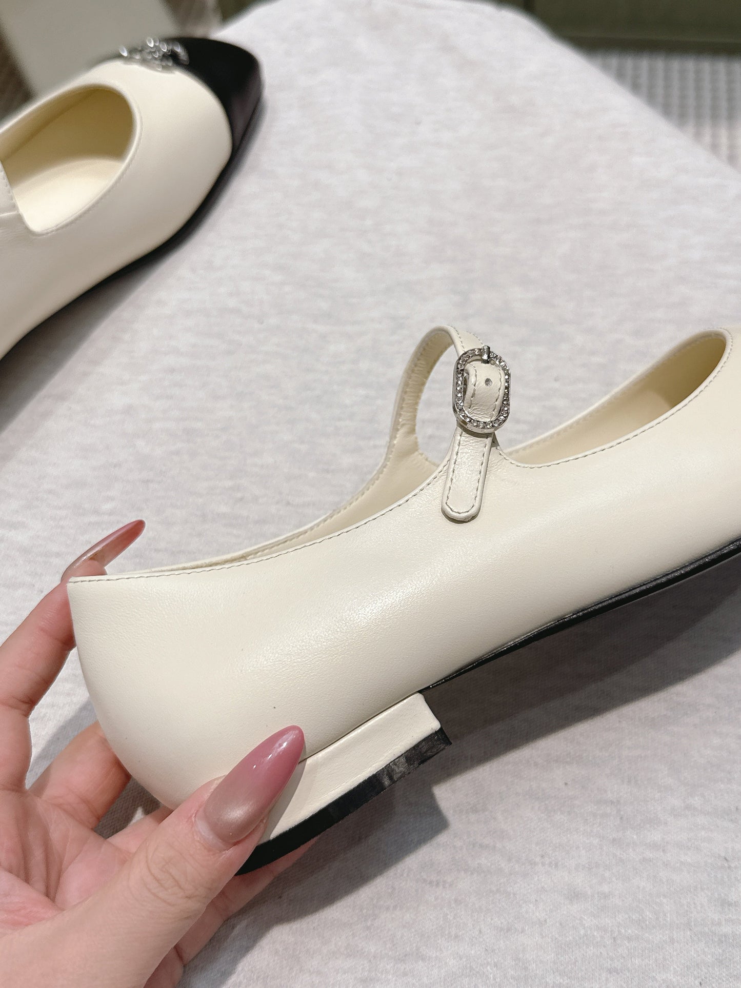 CHANEL 25S MARY JANE FLATS IN IVORY LAMBSKIN WITH BLACK CAP TOE SILVER HARDWARE - 35