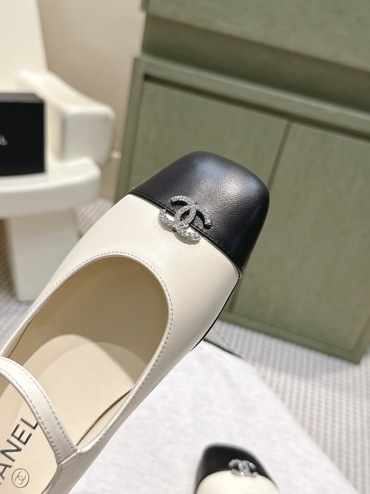 CHANEL 25S MARY JANE FLATS IN IVORY LAMBSKIN WITH BLACK CAP TOE SILVER HARDWARE - 35