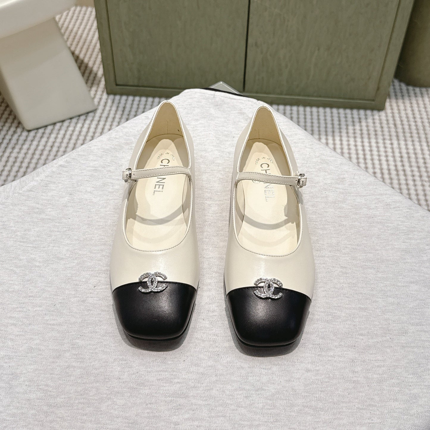 CHANEL 25S MARY JANE FLATS IN IVORY LAMBSKIN WITH BLACK CAP TOE SILVER HARDWARE - 35