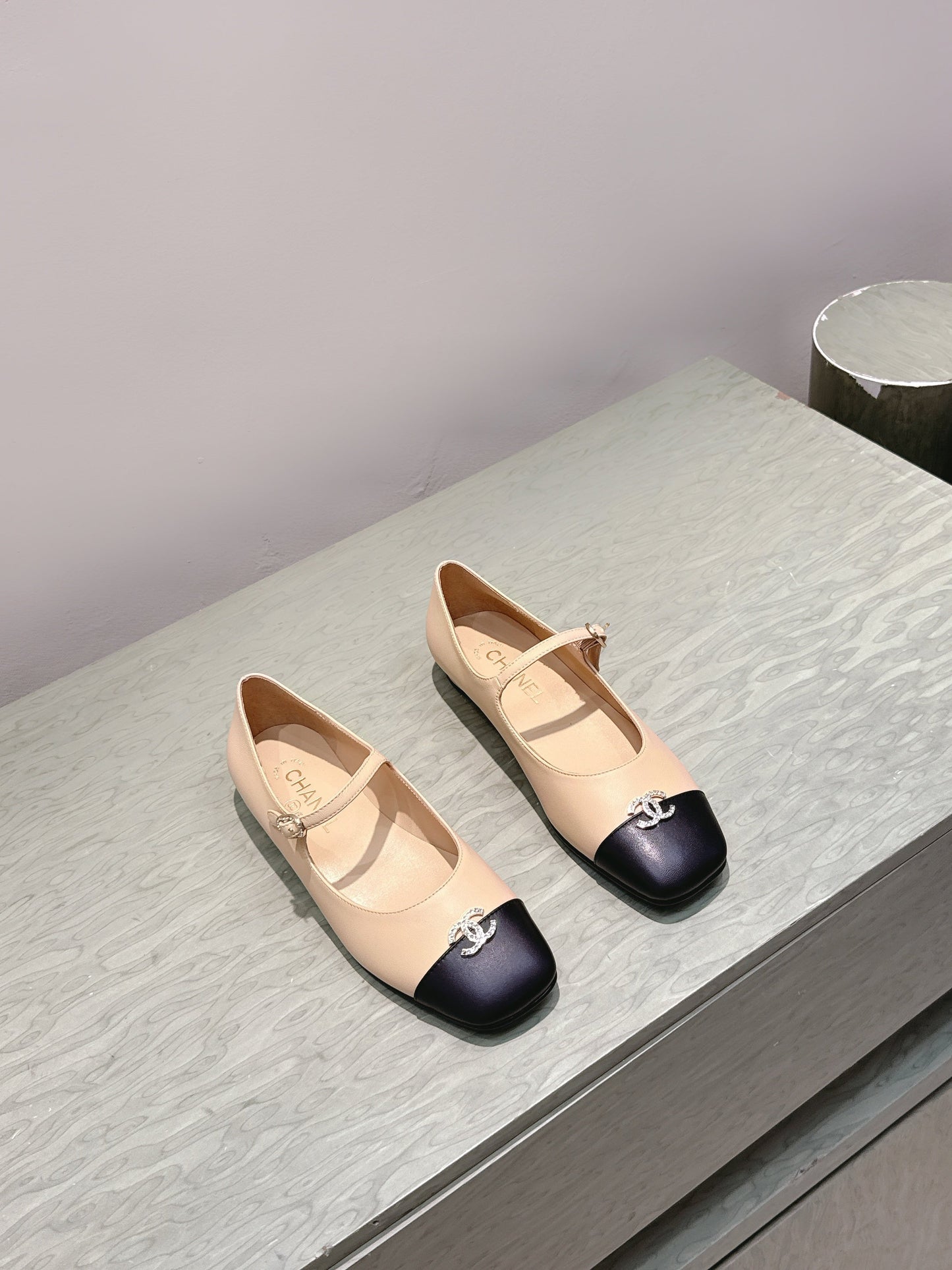 CHANEL 25S MARY JANE FLATS IN BEIGE LAMBSKIN WITH BLACK CAP TOE SILVER HARDWARE - 35