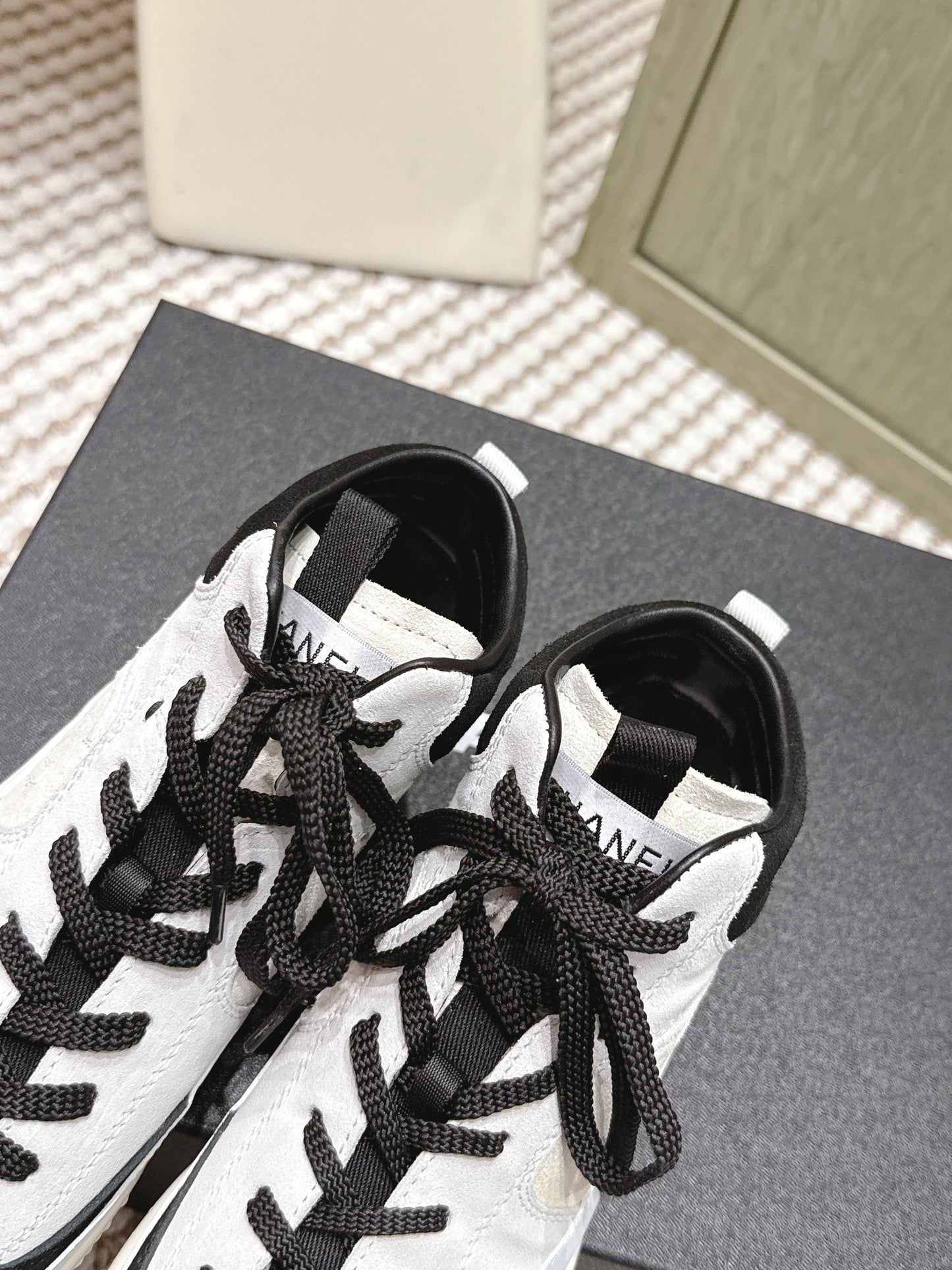 CHANEL 25S HIGH-TOP SNEAKERS IN BLACK AND WHITE CALFSKIN AND SUEDE - 35