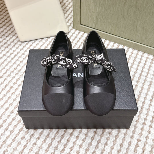 CHANEL 25S MARY JANES IN BLACK SHEARLING AND GROS GRAIN - 35
