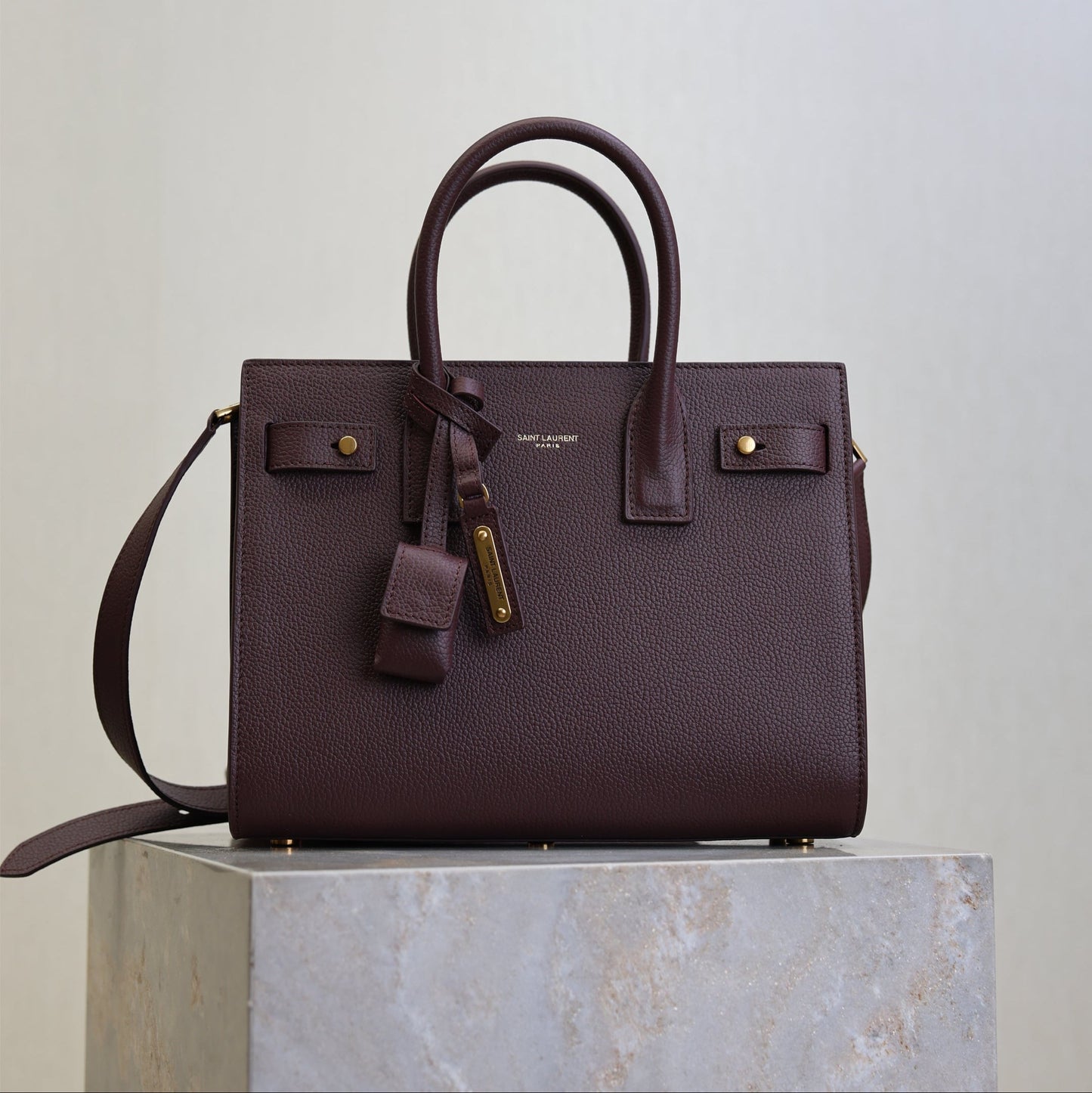 YSL 25S SAC DE JOUR MM 26 IN ROUGE CABERNET SUPPLE GRAINED CALFSKIN