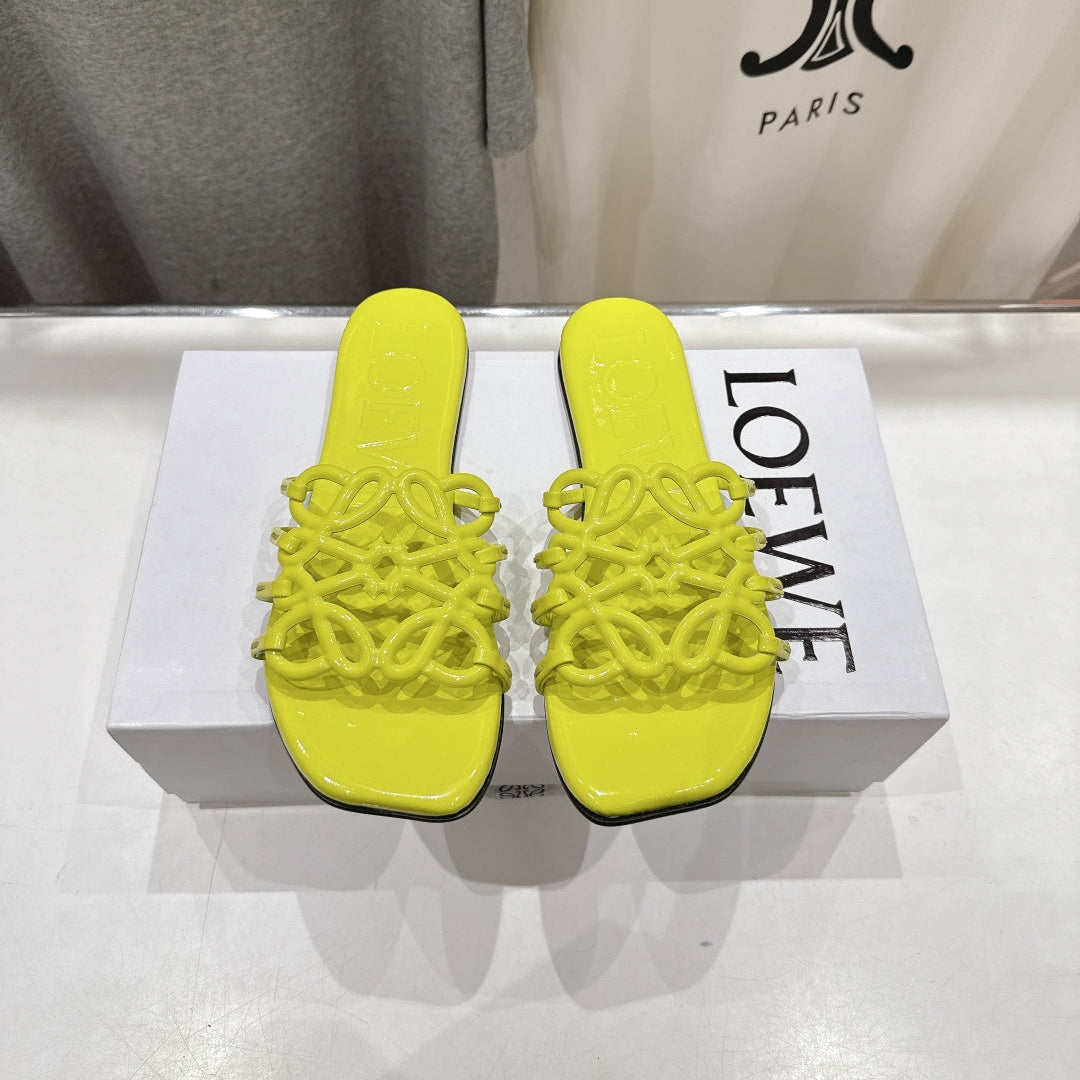 LOEWE 26S PETAL ANAGRAM SLIDE IN LEMON YELLOW CALFSKIN