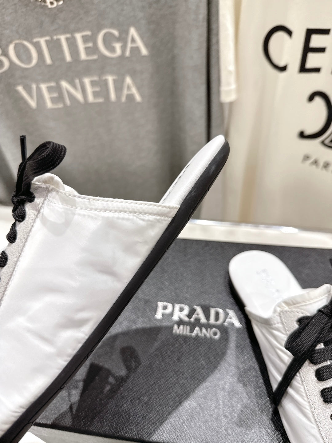 PRADA 25S MULES IN WHITE WITH METAL TOECAP - 35