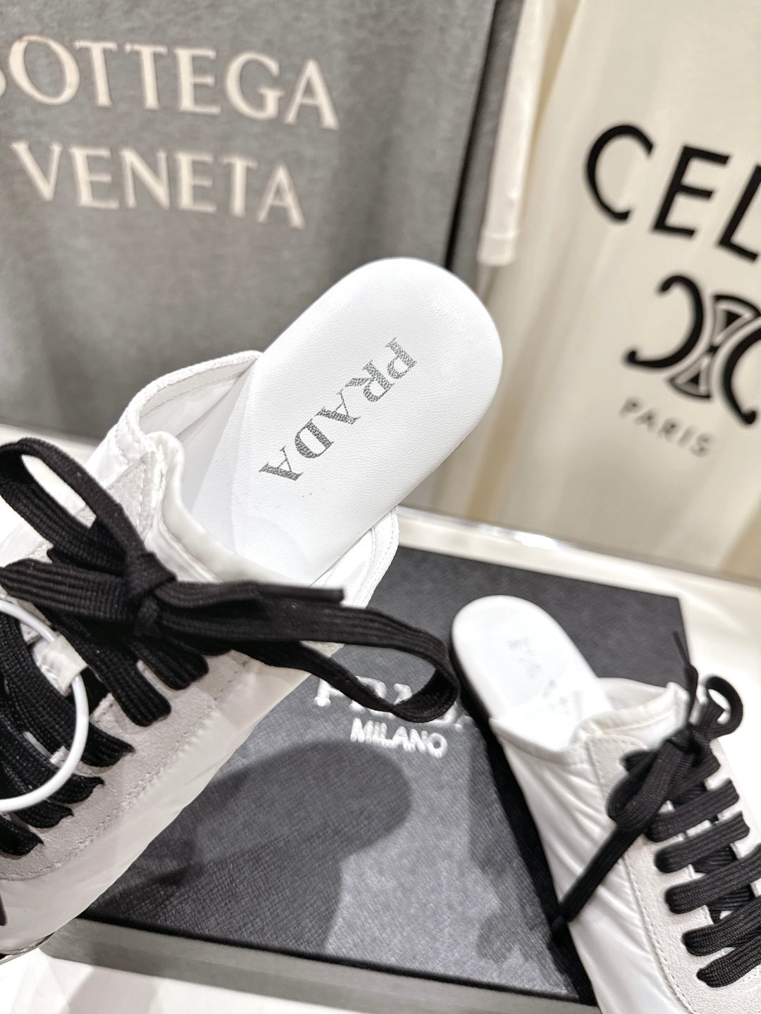 PRADA 25S MULES IN WHITE WITH METAL TOECAP - 35