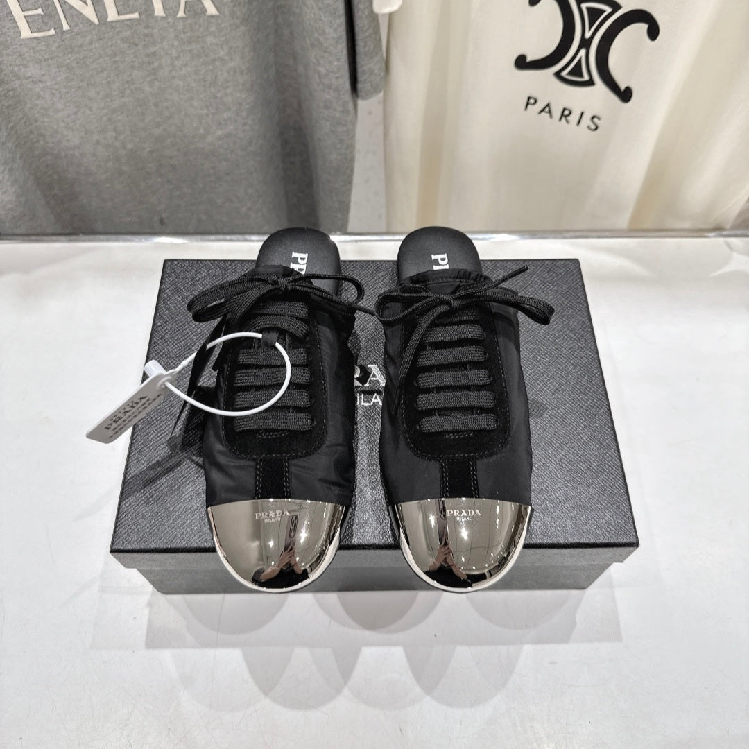 PRADA 25S MULES IN BLACK WITH METAL TOECAP - 35