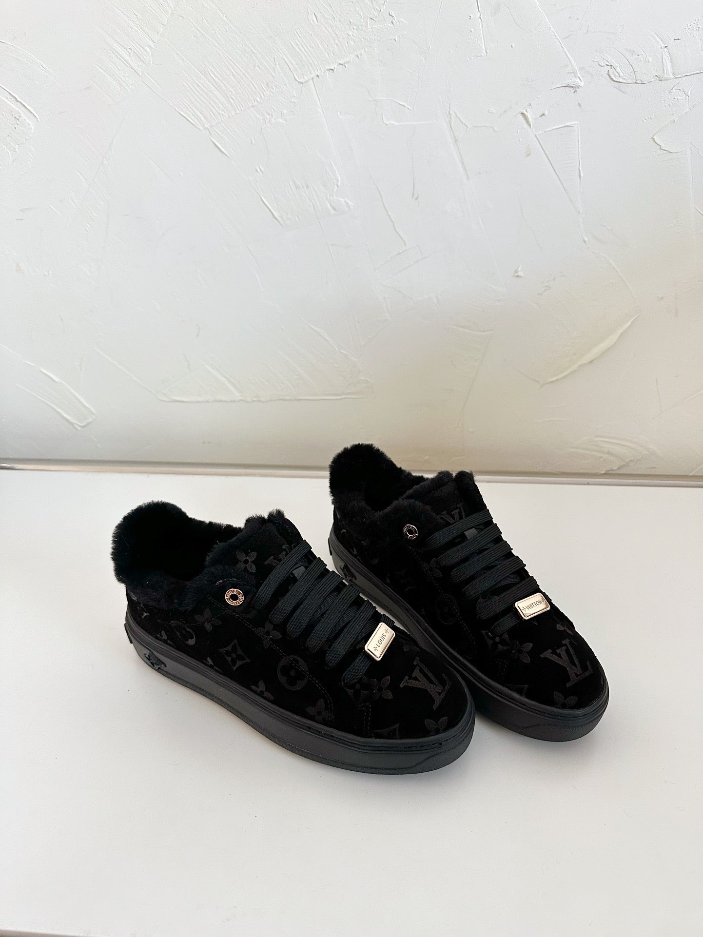 TIME OUT SNEAKER IN BLACK MONOGRAM EMBOSSED SUEDE WITH FLEECE LINING - 34