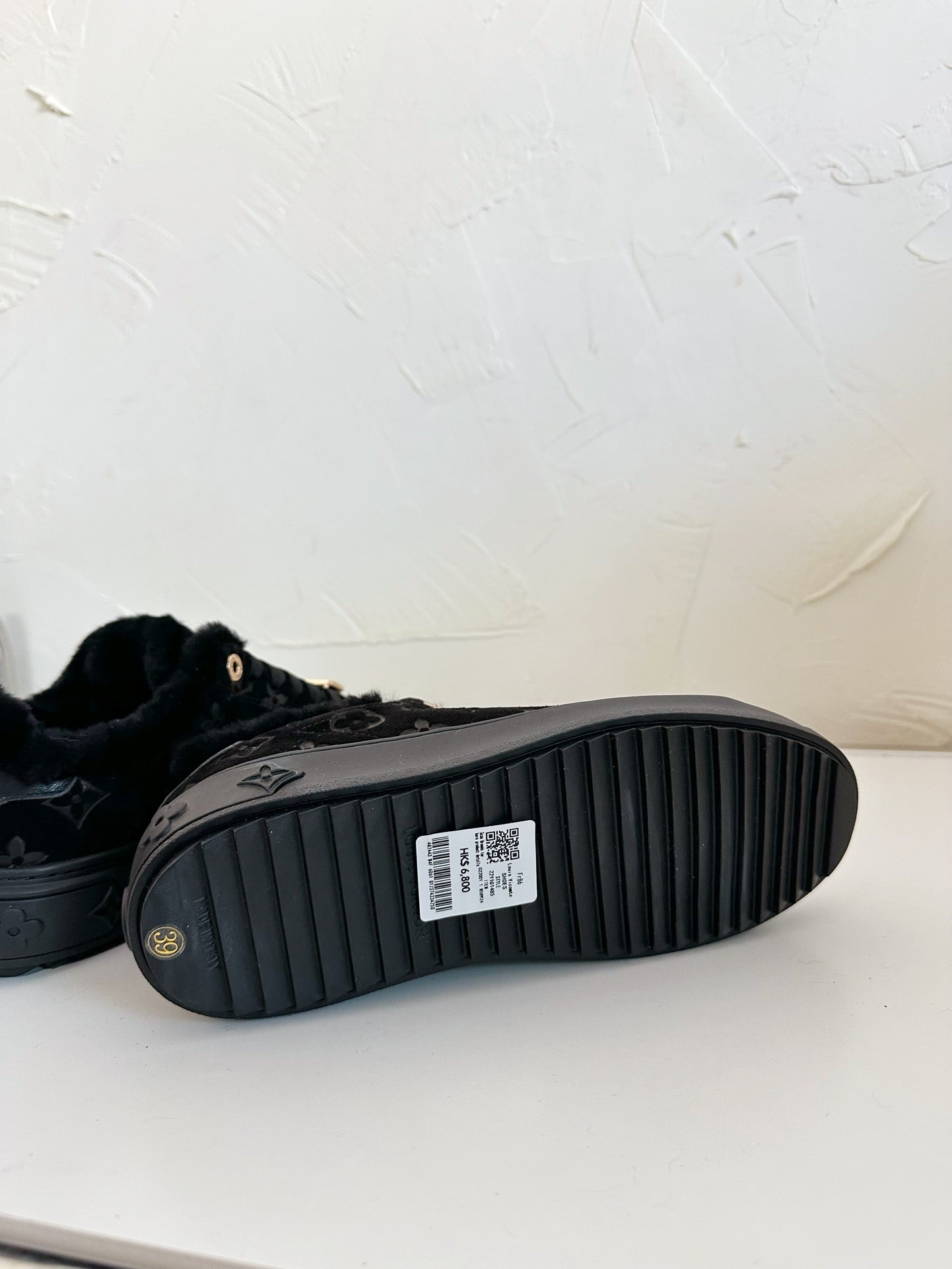 TIME OUT SNEAKER IN BLACK MONOGRAM EMBOSSED SUEDE WITH FLEECE LINING - 34