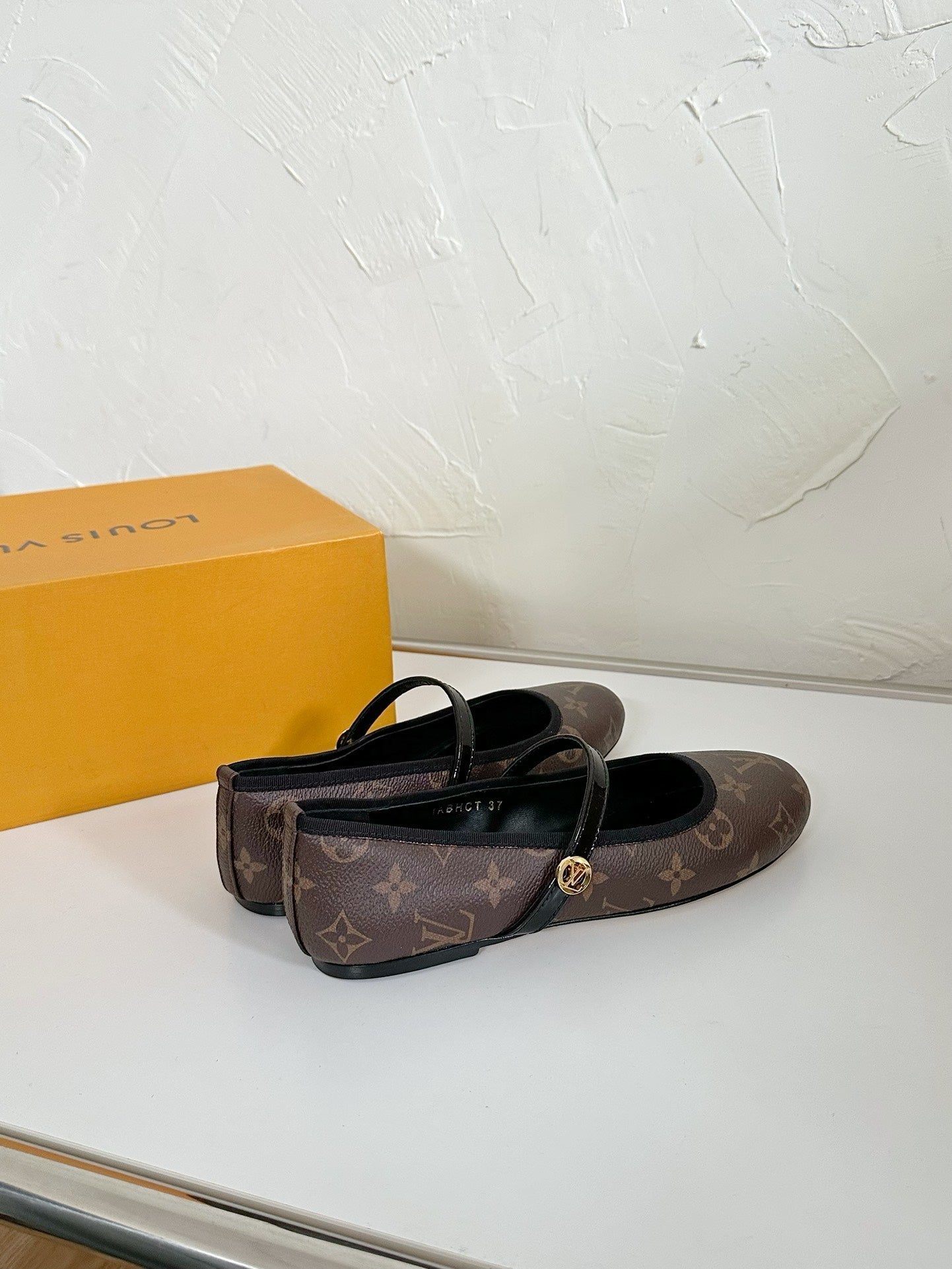 ROMY FLAT BALLERINA IN BROWN MONOGRAM CALFSKIN - 35