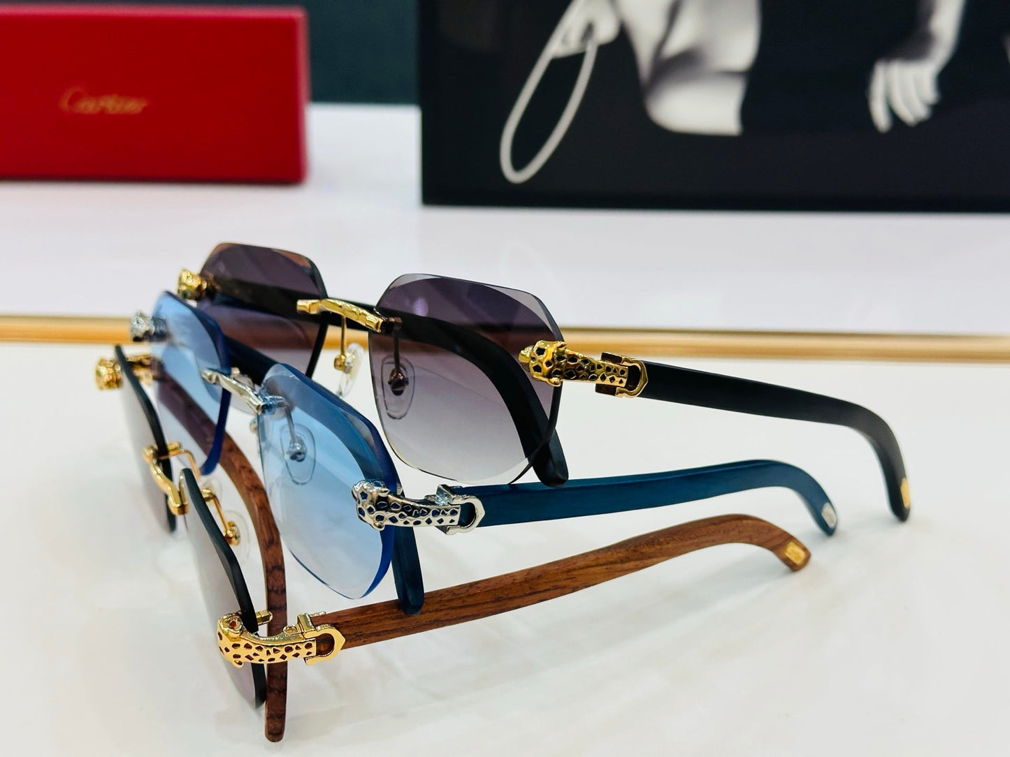 PANTHÈRE RIMLESS OVAL FRAME SUNGLASSES  543637 IN METAL - Red