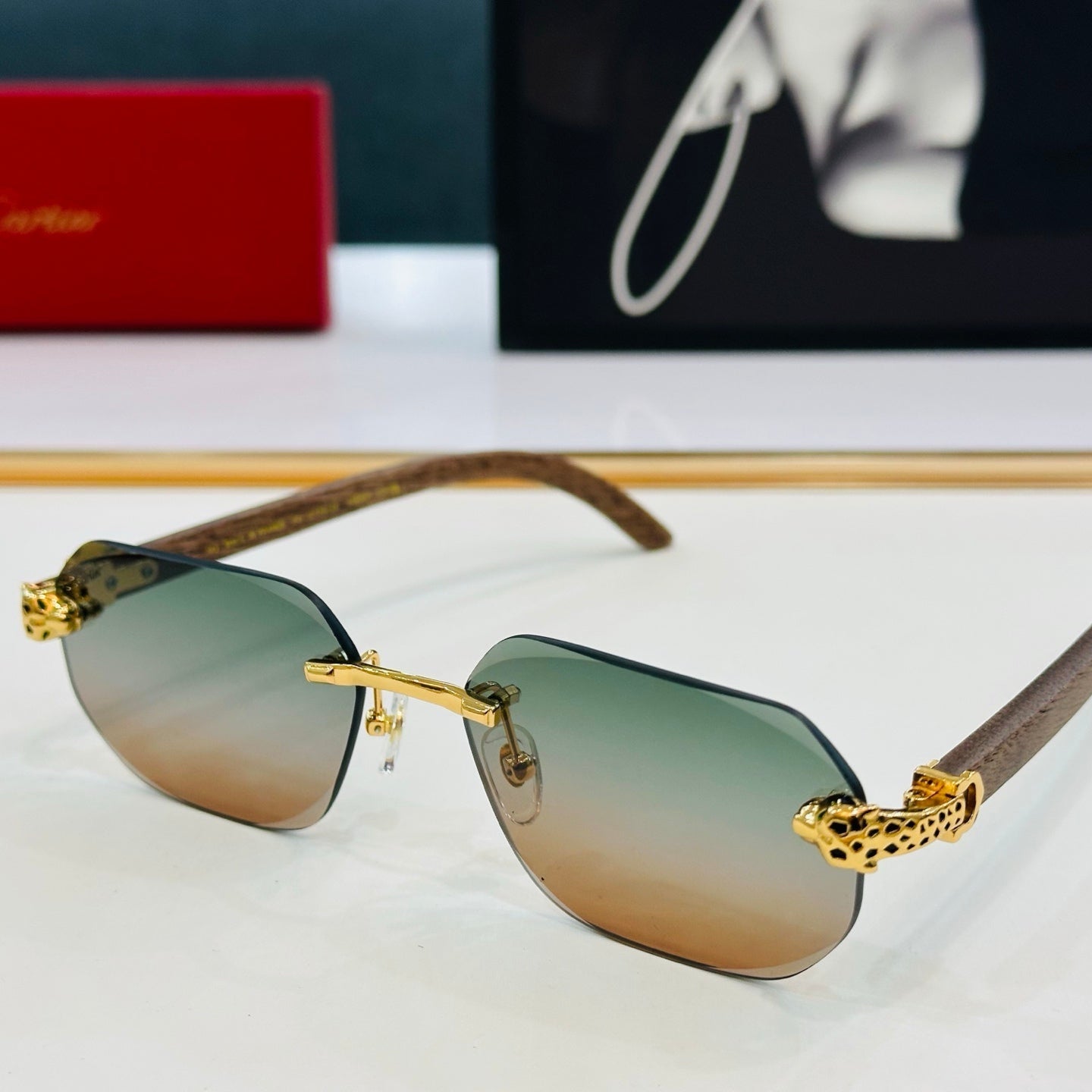 PANTHÈRE RIMLESS OVAL FRAME SUNGLASSES  543637 IN METAL - Red