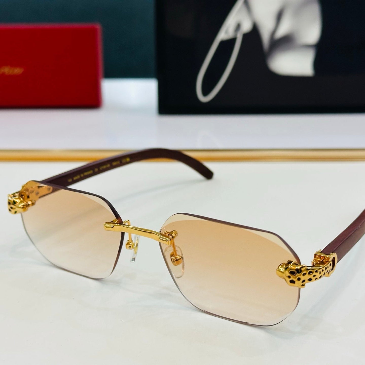 PANTHÈRE RIMLESS OVAL FRAME SUNGLASSES  543637 IN METAL - Red