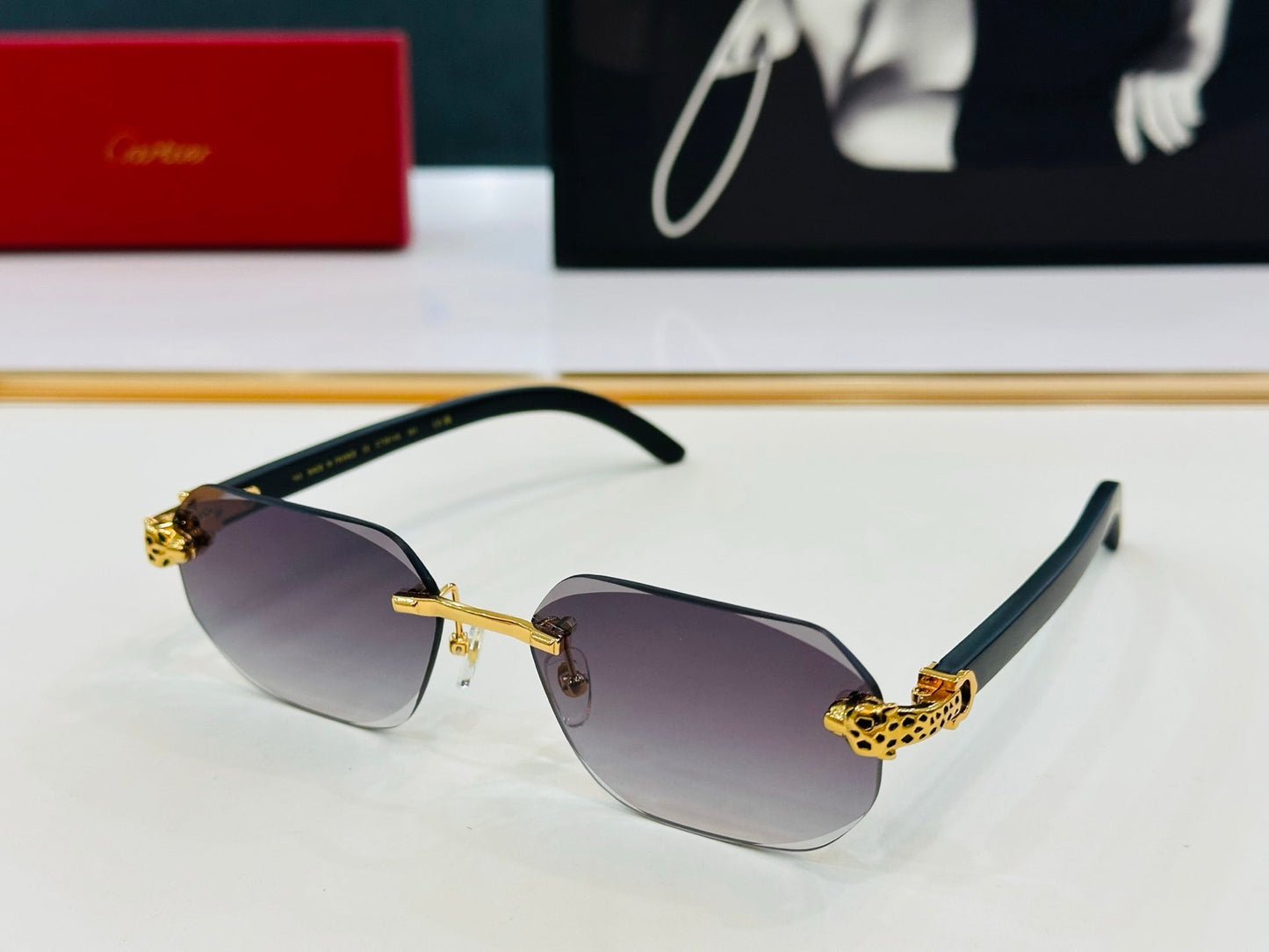 PANTHÈRE RIMLESS OVAL FRAME SUNGLASSES  543637 IN METAL - Red
