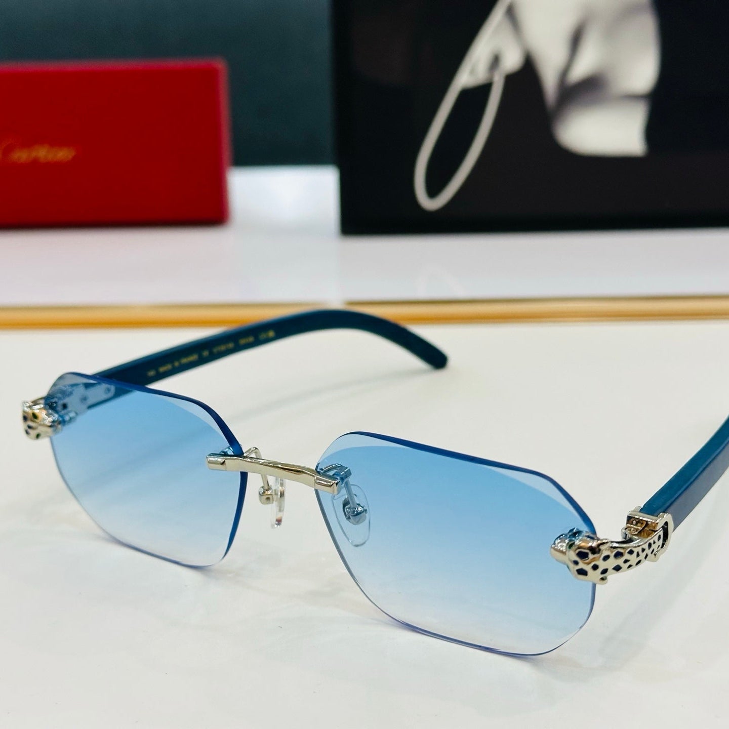 PANTHÈRE RIMLESS OVAL FRAME SUNGLASSES  543637 IN METAL - Red