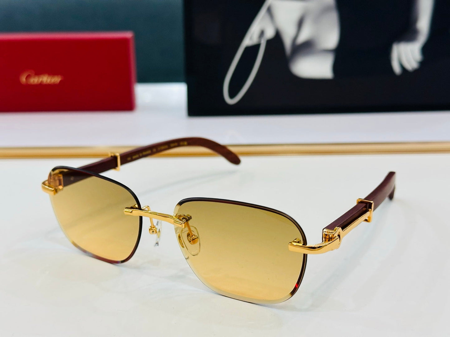 C DE RIMLESS SQUARE FRAME SUNGLASSES CT0605S IN METAL AND WOODEN - Light purple
