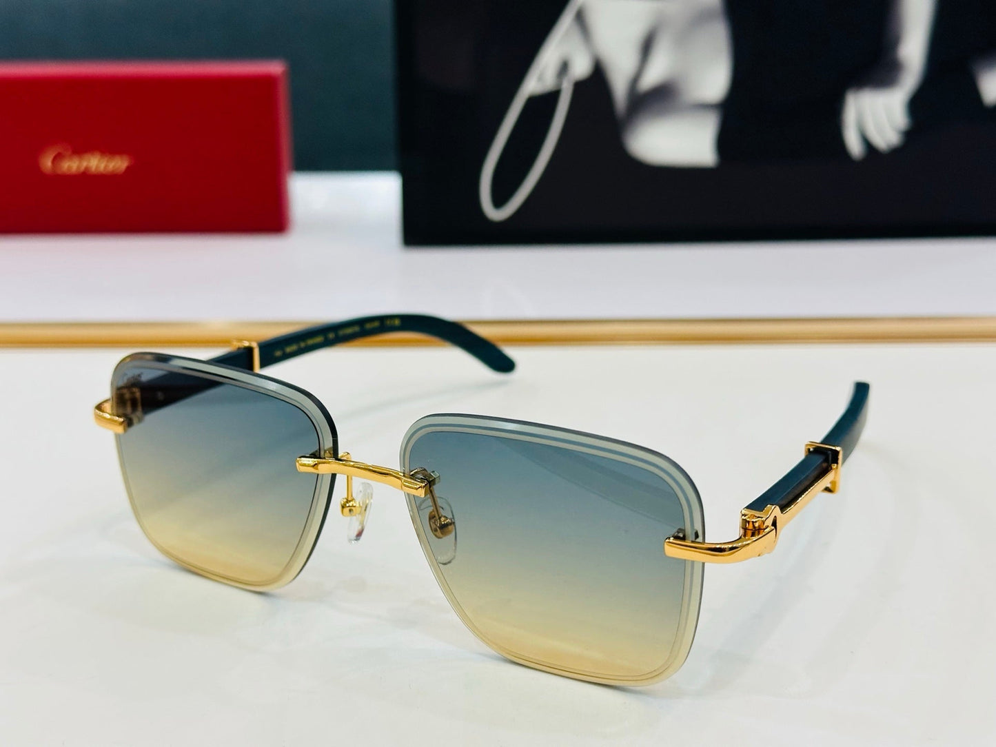 C DE RIMLESS RECTANGULAR FRAME SUNGLASSES CT0607S IN METAL AND WOODEN - Yellow