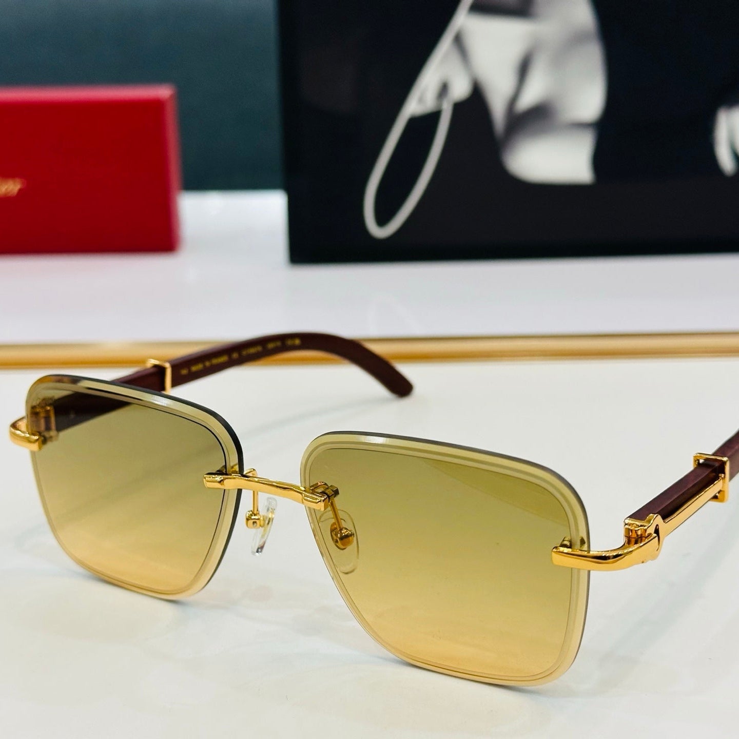C DE RIMLESS RECTANGULAR FRAME SUNGLASSES CT0607S IN METAL AND WOODEN - Yellow