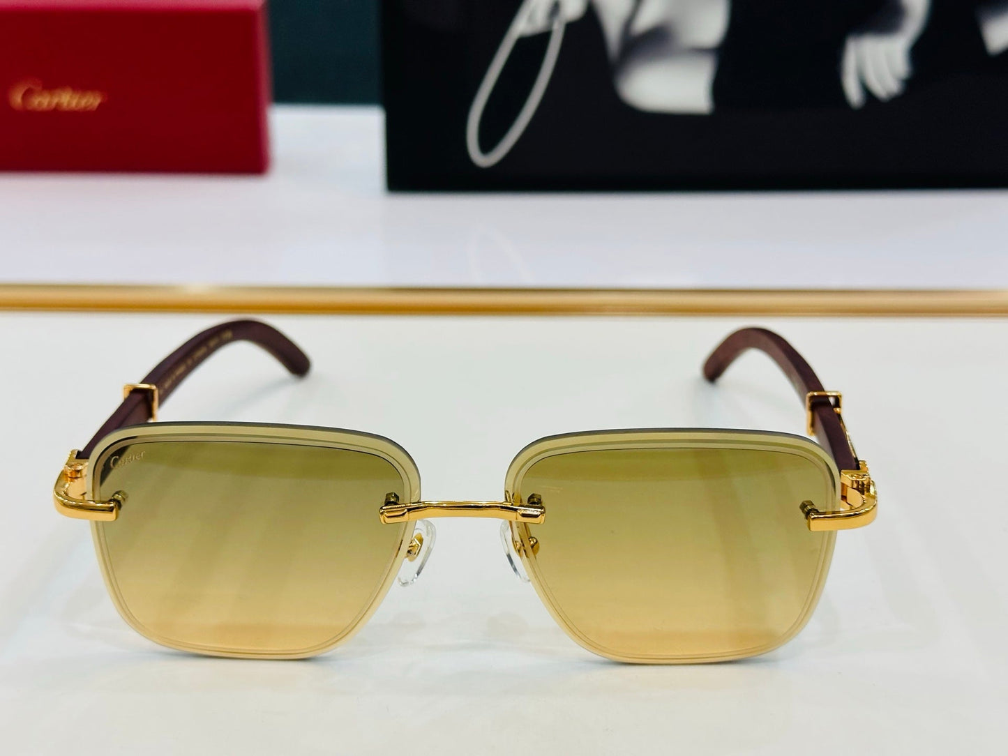 C DE RIMLESS RECTANGULAR FRAME SUNGLASSES CT0607S IN METAL AND WOODEN - Yellow