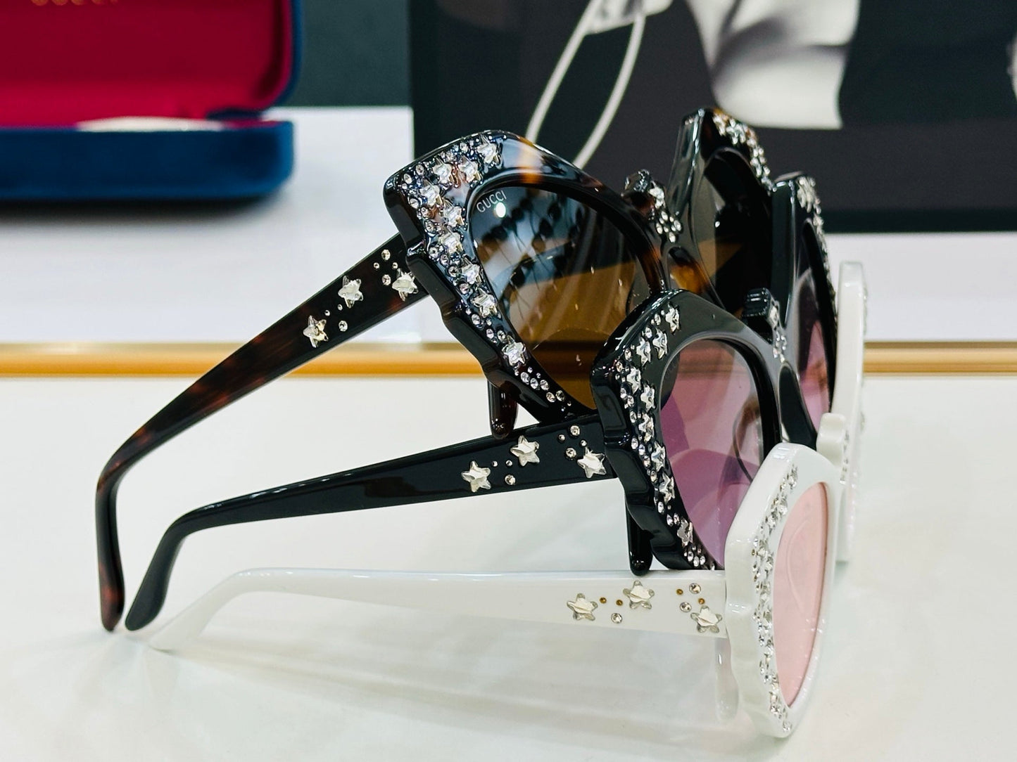 CRYSTAL STUDDED CAT-EYE FRAME SUNGLASSES GG1095S IN ACETATE - White/ pink