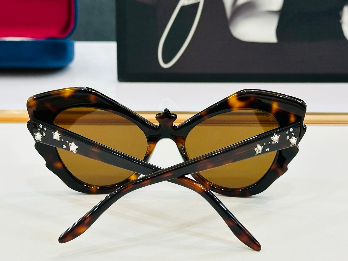 CRYSTAL STUDDED CAT-EYE FRAME SUNGLASSES GG1095S IN ACETATE - White/ pink