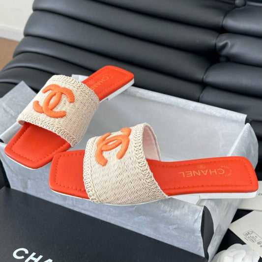 WOVEN SLIDE IN RAFFIA AND VIVID ORANGE LAMBSKIN - 35