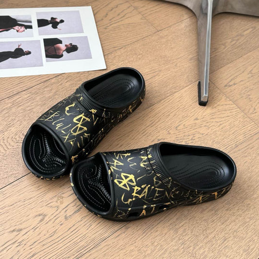 POOL GRAFFITI CROCS SLIDE SANDALS IN BLACK AND YELLOW RUBBER - 35