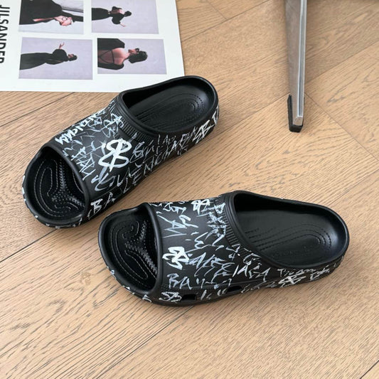 POOL GRAFFITI CROCS SLIDE SANDALS IN BLACK AND WHITE RUBBER - 35
