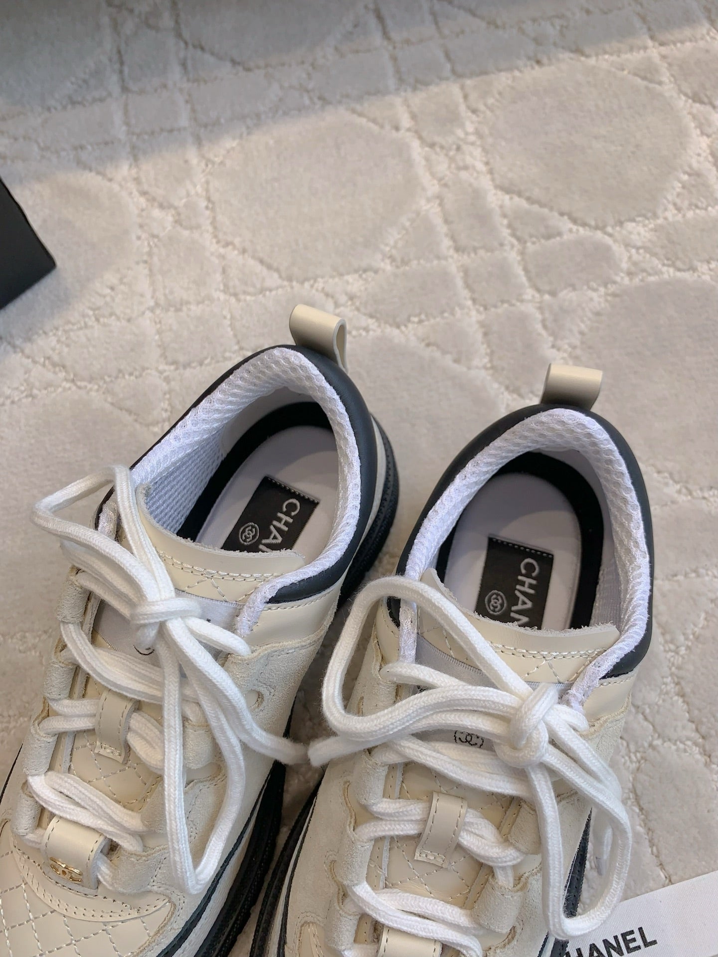 CHANEL 25S TRAINERS 40MM IN WHITE AND BLACK CALFSKIN - 35