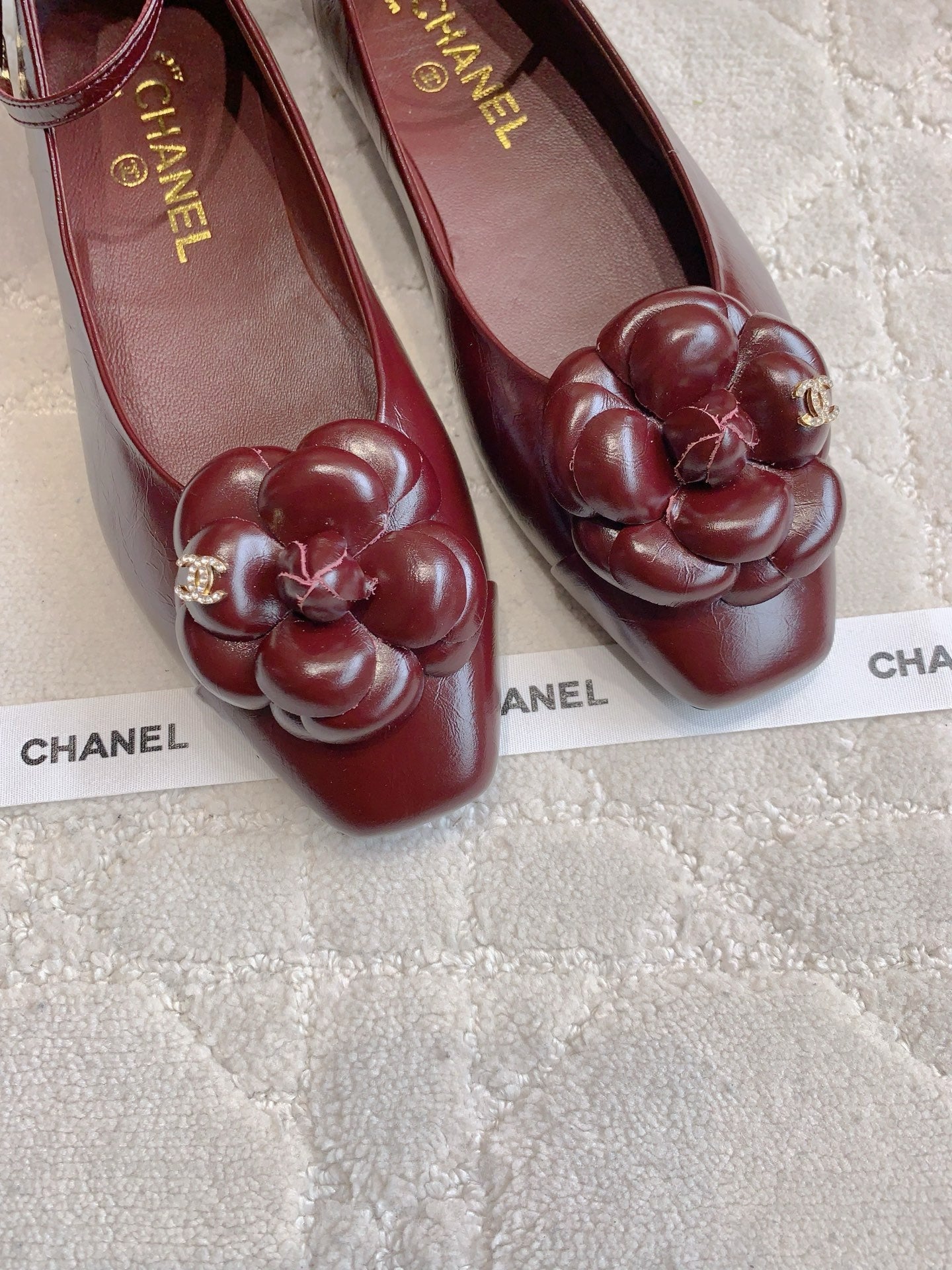 CHANEL 25S CAMELLIA SQUARE TOE FLATS IN ROSSO ANCORA CALFSKIN GOLD HARDWARE - 35