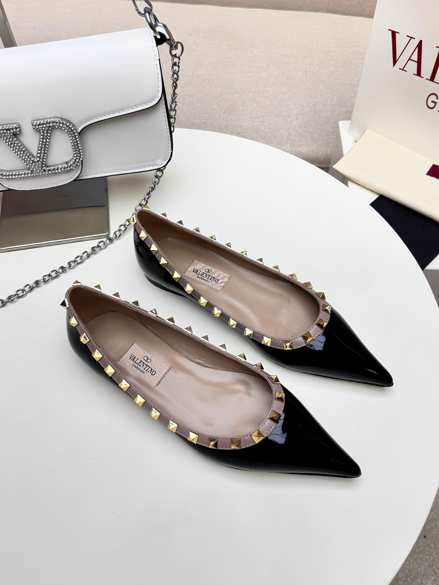 ROCKSTUD FLAT PUMP IN BLACK CALFSKIN - 34