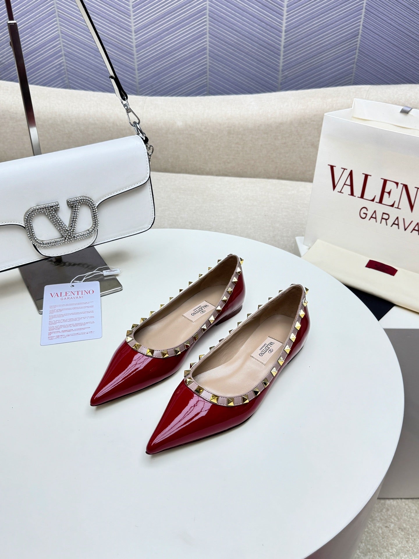 ROCKSTUD FLAT PUMP IN BERRY RED CALFSKIN - 34