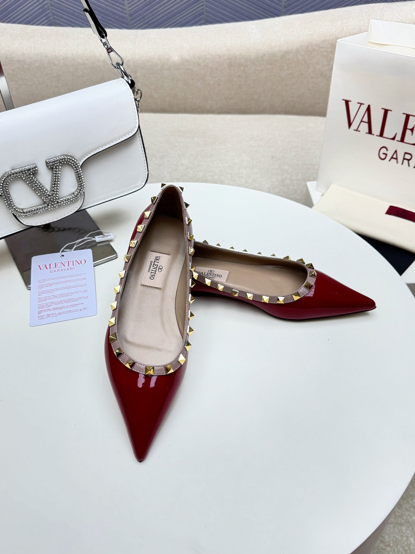 ROCKSTUD FLAT PUMP IN BERRY RED CALFSKIN - 34